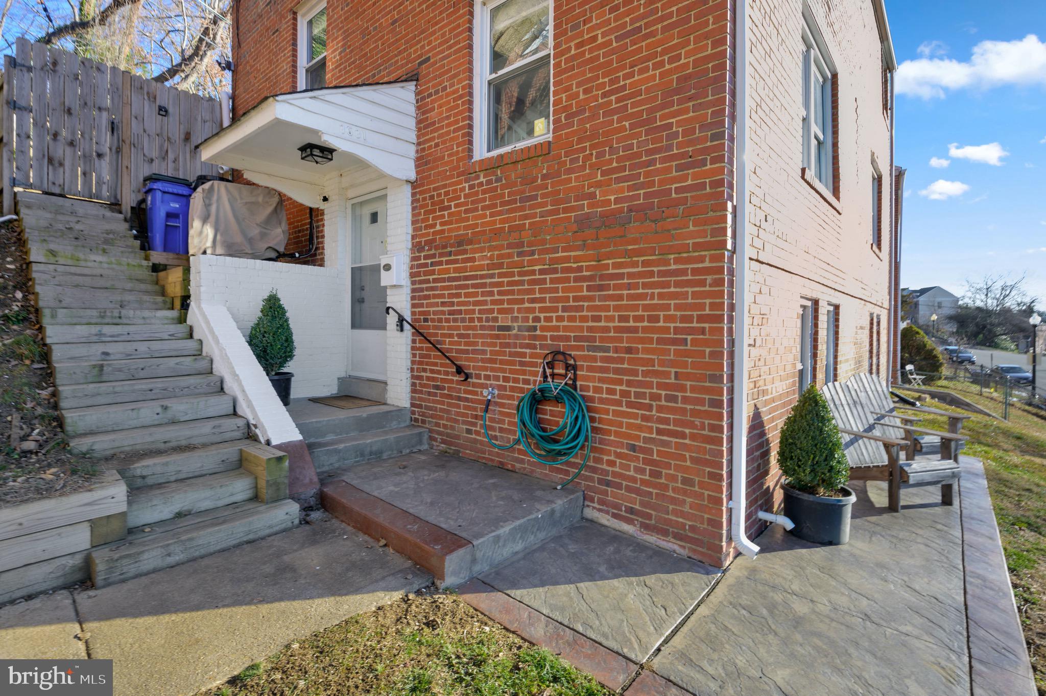 3631 South Kemper Road Arlington, VA 22206 - Photo 20 of 30 Stamped concrete front patio & new stairs to yard