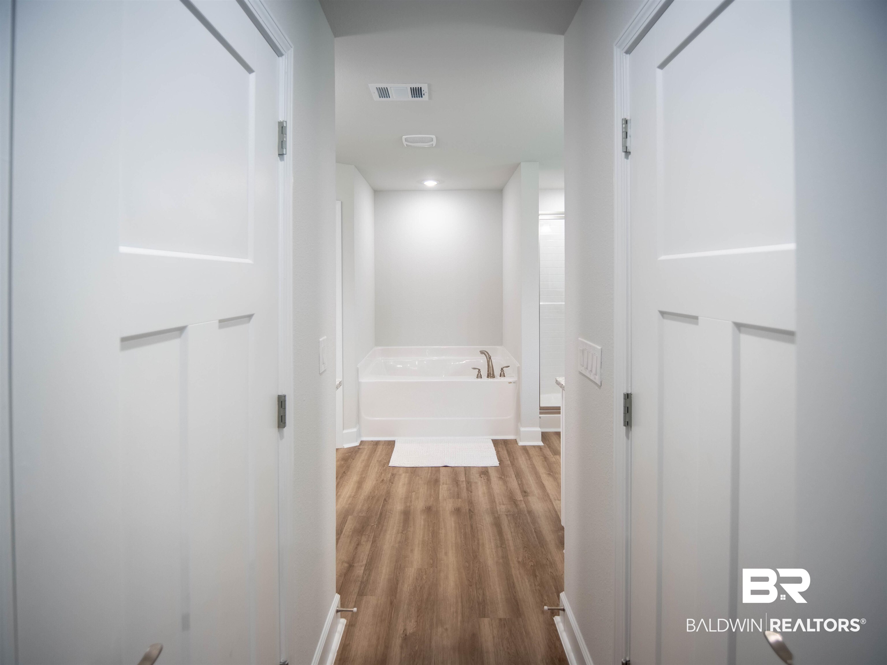 12646 Michigan Avenue Elberta, AL 36530 - Photo 19 of 47 Corridor featuring wood finished floors and recessed lighting