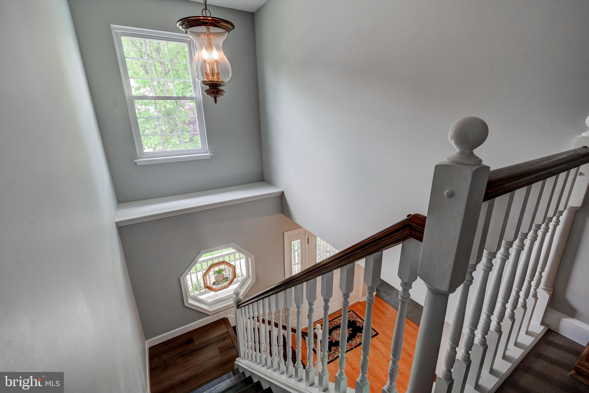 105 Annapolis Drive Sicklerville, NJ 08081 - Photo 24 of 56 a view of entryway and hall with wooden floor