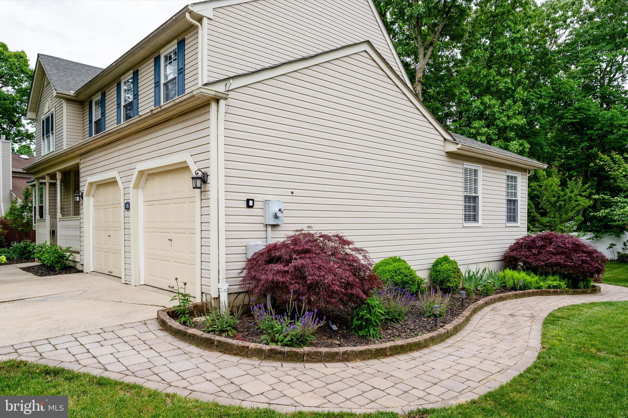 105 Annapolis Drive Sicklerville, NJ 08081 - Photo 4 of 56 a front view of a house with garden