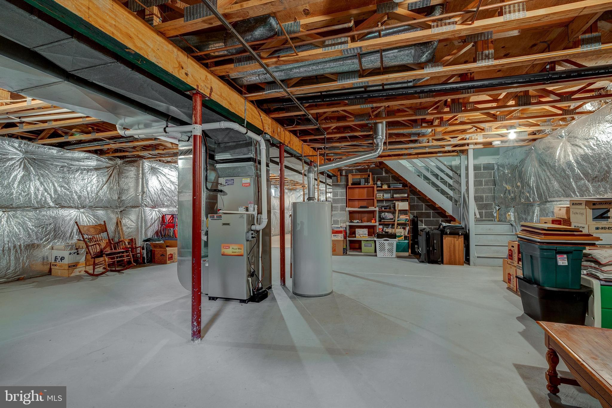 105 Annapolis Drive Sicklerville, NJ 08081 - Photo 43 of 56 a view of a garage with wooden table and chairs