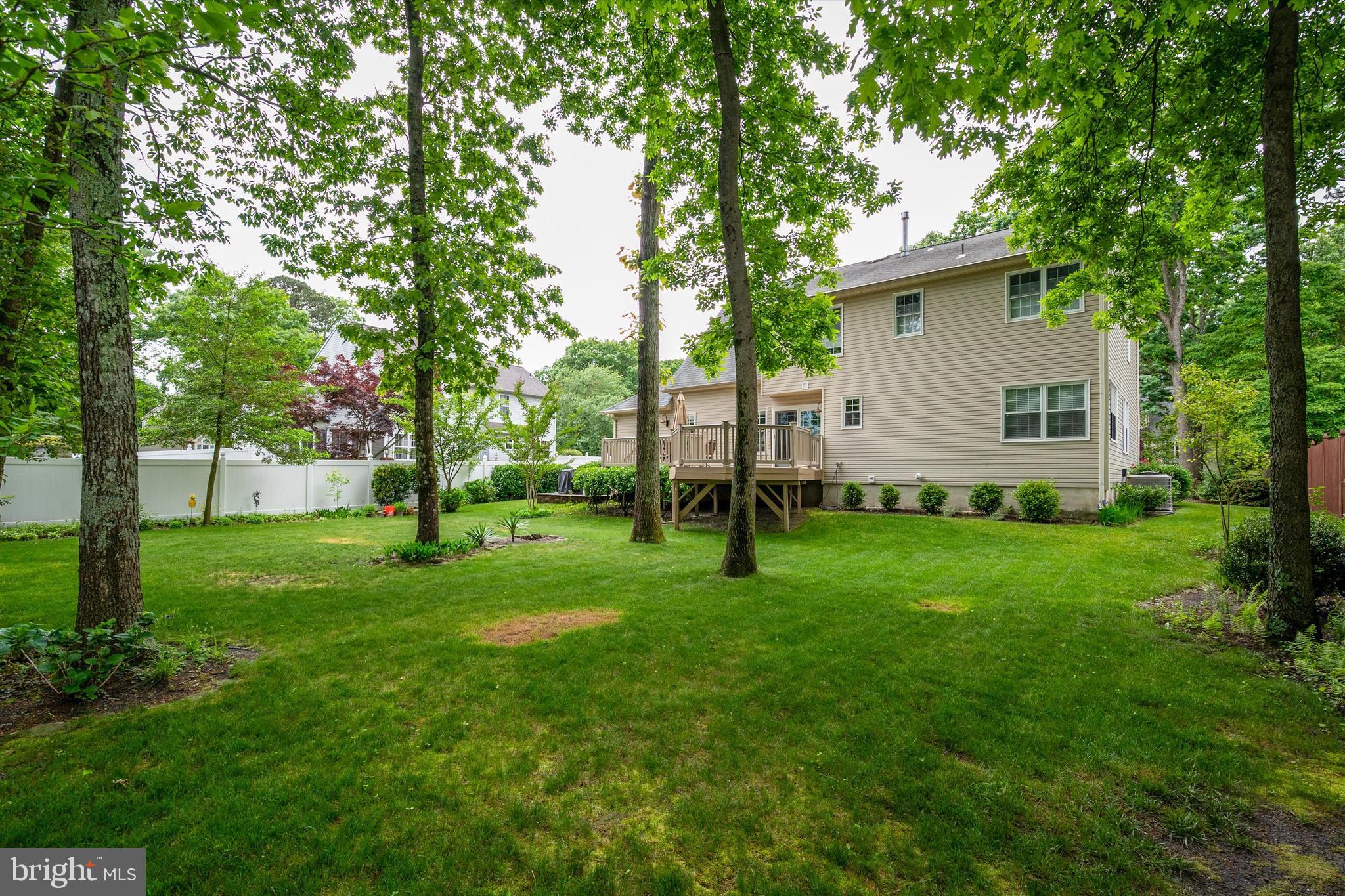 105 Annapolis Drive Sicklerville, NJ 08081 - Photo 45 of 56 a view of backyard of house with green space