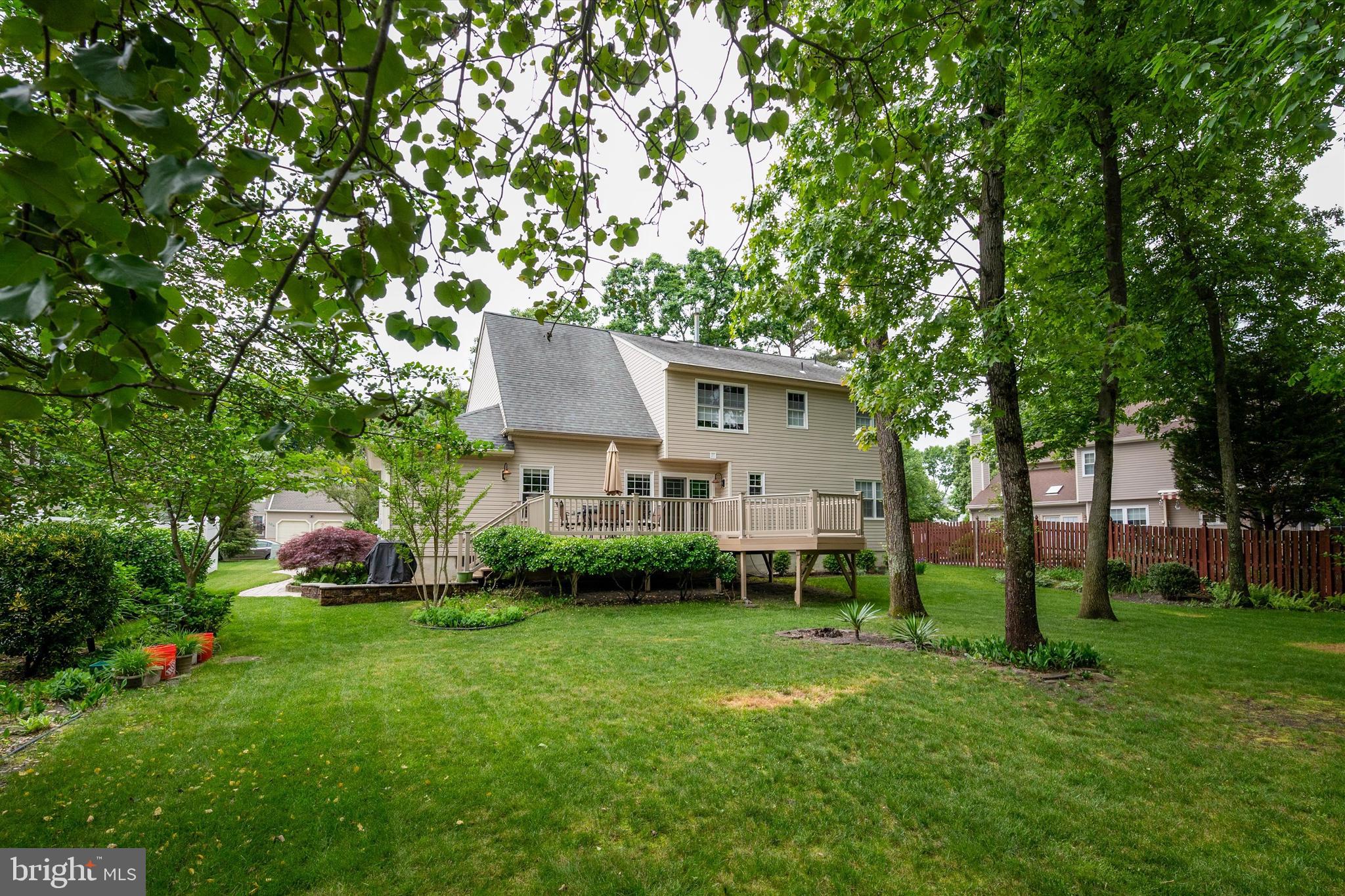 105 Annapolis Drive Sicklerville, NJ 08081 - Photo 46 of 56 a front view of a house with garden