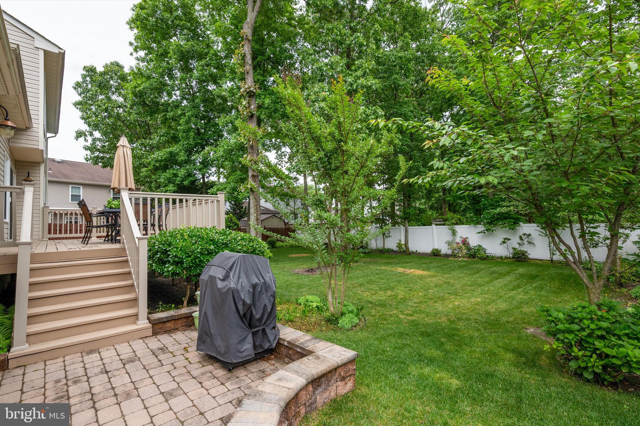105 Annapolis Drive Sicklerville, NJ 08081 - Photo 48 of 56 a view of a garden with plants and large trees