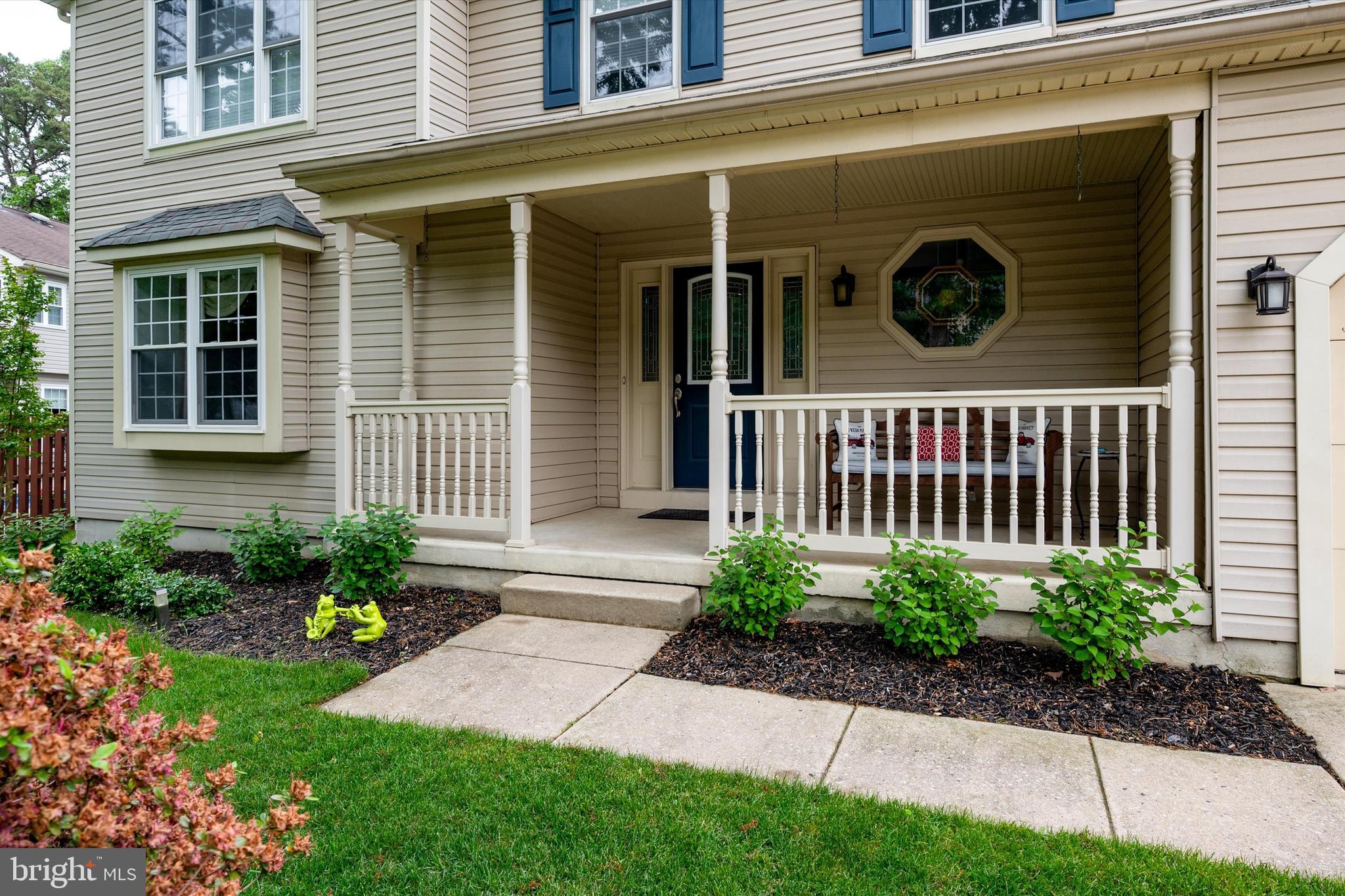 105 Annapolis Drive Sicklerville, NJ 08081 - Photo 7 of 56 a view of a house with a yard and plants