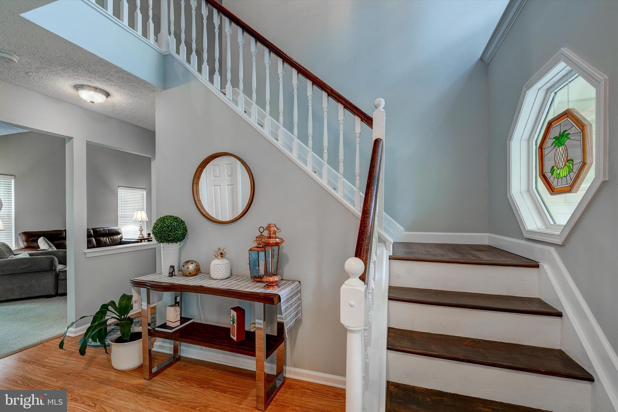 105 Annapolis Drive Sicklerville, NJ 08081 - Photo 9 of 56 a living room with furniture and a wooden floor
