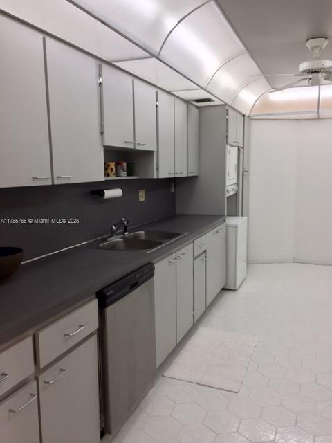 1111 Crandon Boulevard, Unit B804 Key Biscayne, FL 33149 - Photo 9 of 19 a kitchen with stainless steel appliances granite countertop a sink a stove and a refrigerator