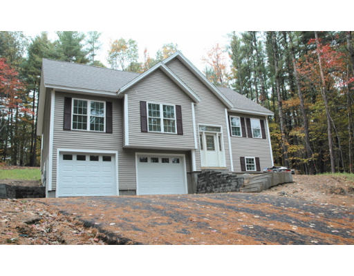 406 Mason Road Milford, NH 03055 - Photo 1 of 1 a front view of a house with a yard