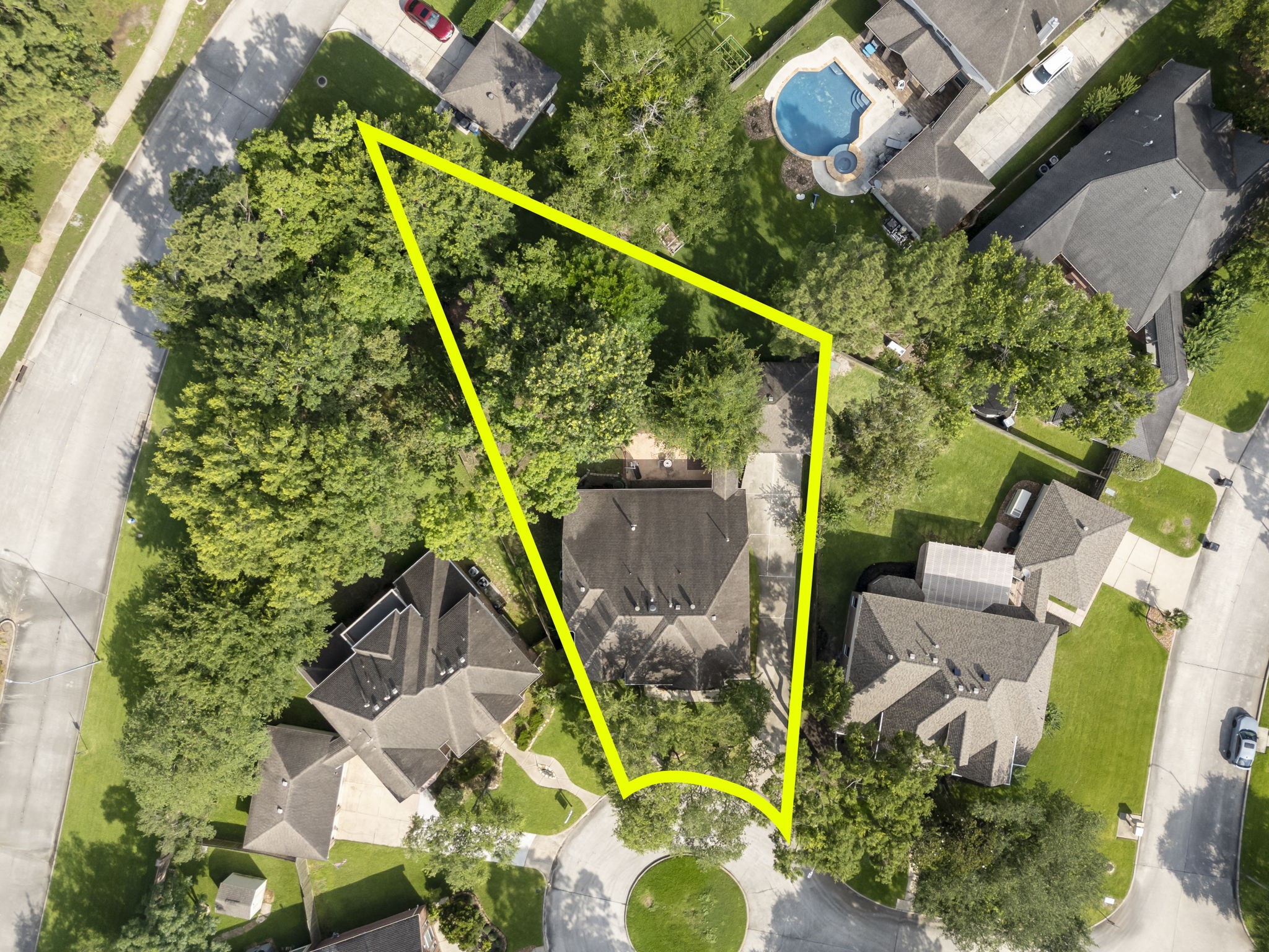12907 Ryaneagles Circle Houston, TX 77044 - Photo 44 of 48 an aerial view of a house with swimming pool and garden