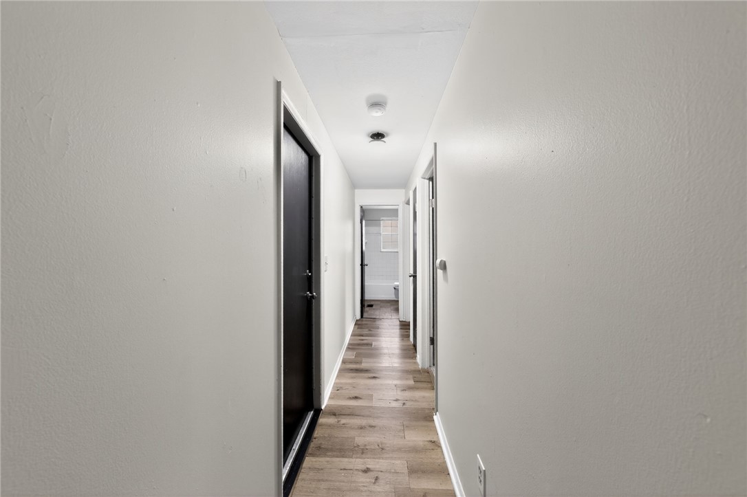 6070 Charlesgate Road Huber Heights, OH 45424 - Photo 25 of 29 This clean and inviting hallway offers seamless access to various rooms.