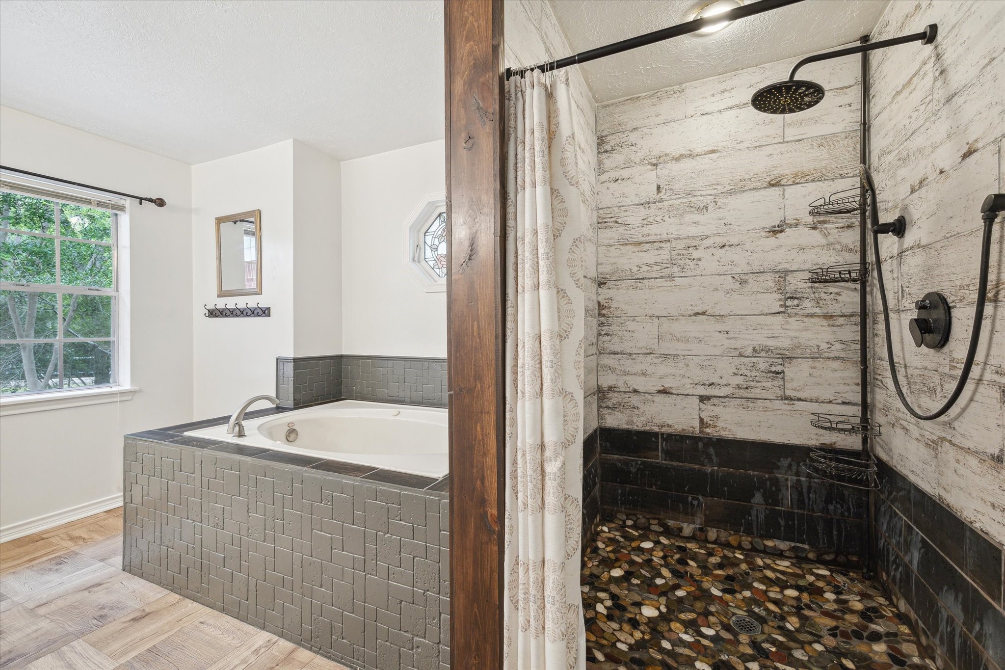 2420 Canter Lane Conroe, TX 77384 - Photo 16 of 24 a bathroom with a shower and a sink
