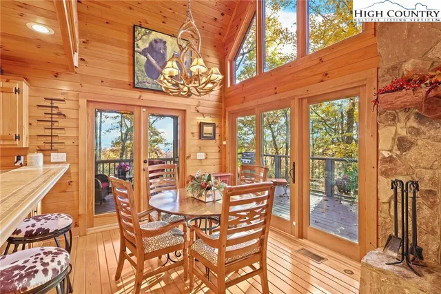 a kitchen with stainless steel appliances granite countertop a sink and wooden cabinets