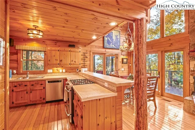 a kitchen with a stove and a sink