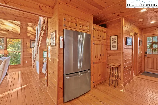 a open kitchen with stainless steel appliances granite countertop a sink and cabinets