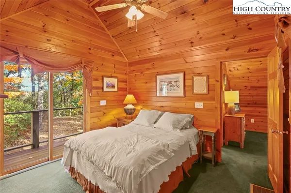 a bedroom with a bed and a closet
