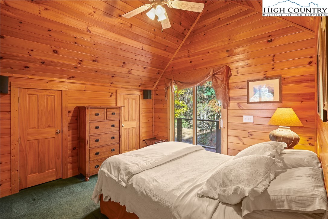 675 Cabin Ridge Road Ferguson, NC 28624 - Photo 31 of 50 a bedroom with a bed and a closet