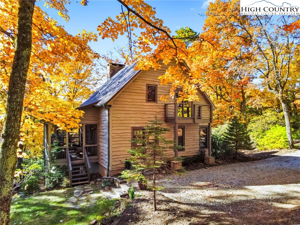 675 Cabin Ridge Road Ferguson, NC 28624 - Photo 48 of 50 a view of a house with a tree