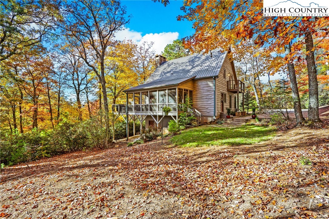 675 Cabin Ridge Road Ferguson, NC 28624 - Photo 49 of 50 a view of a house with a yard