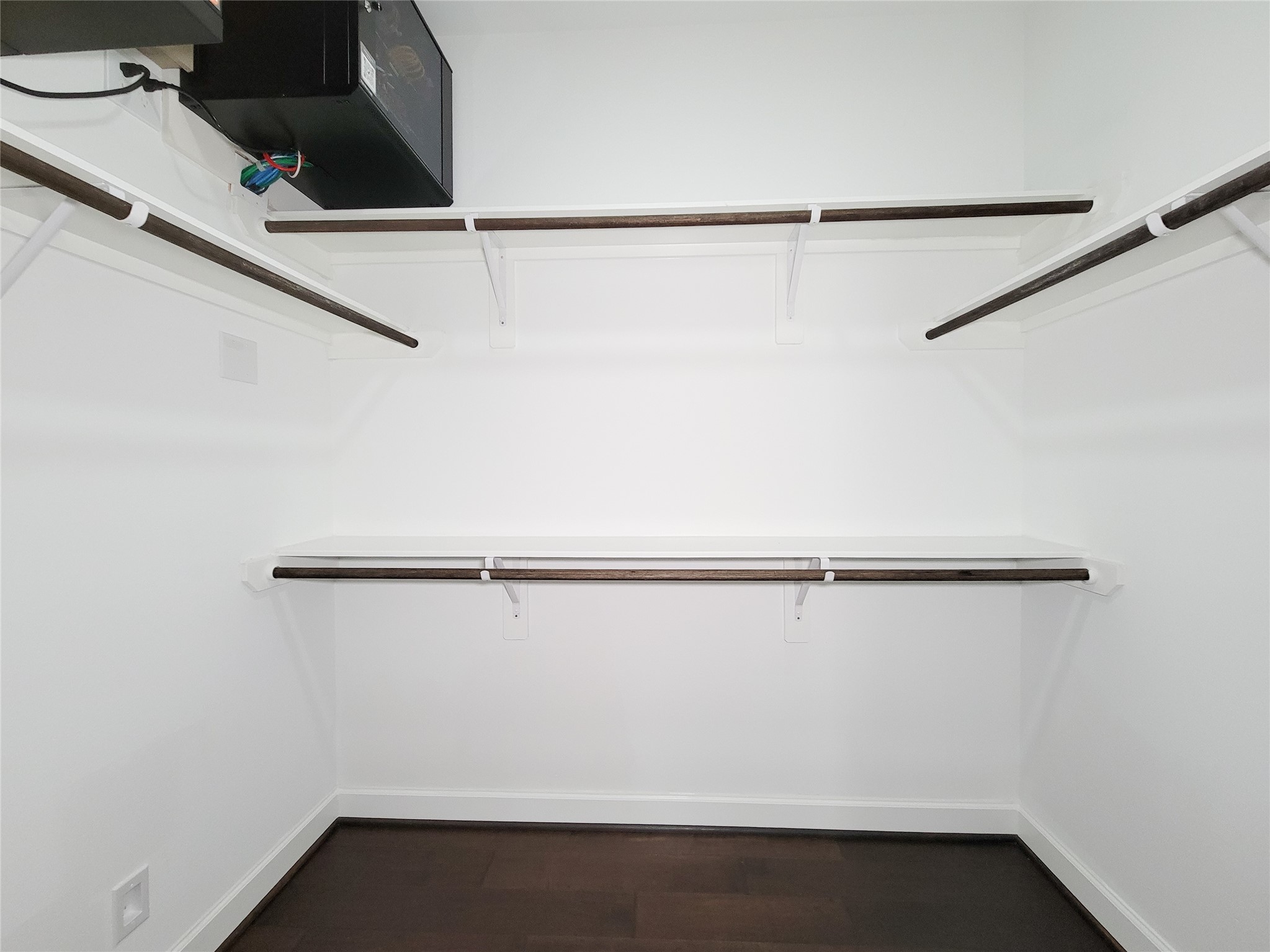 845 Fisher Street, Unit E Houston, TX 77018 - Photo 40 of 47 a view of a room with racks on the wall