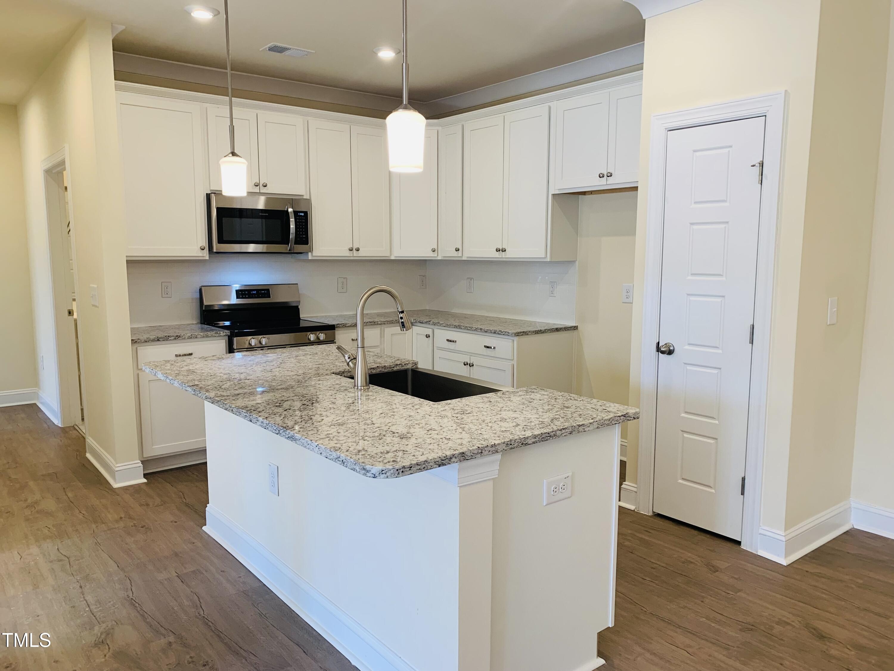 403 Weather Ridge Lane, Unit 42 Cary, NC 27513 - Photo 4 of 17 {WCC 403 Kitchen photo1