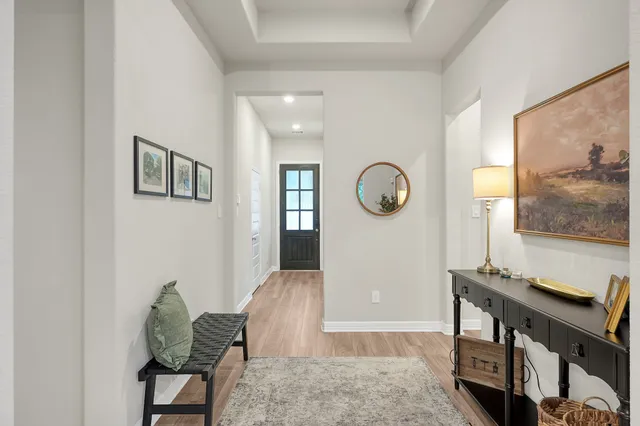a bedroom with a bed a bookshelf and a bookshelf
