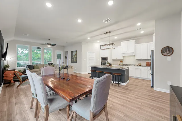 a view of a dining room with furniture