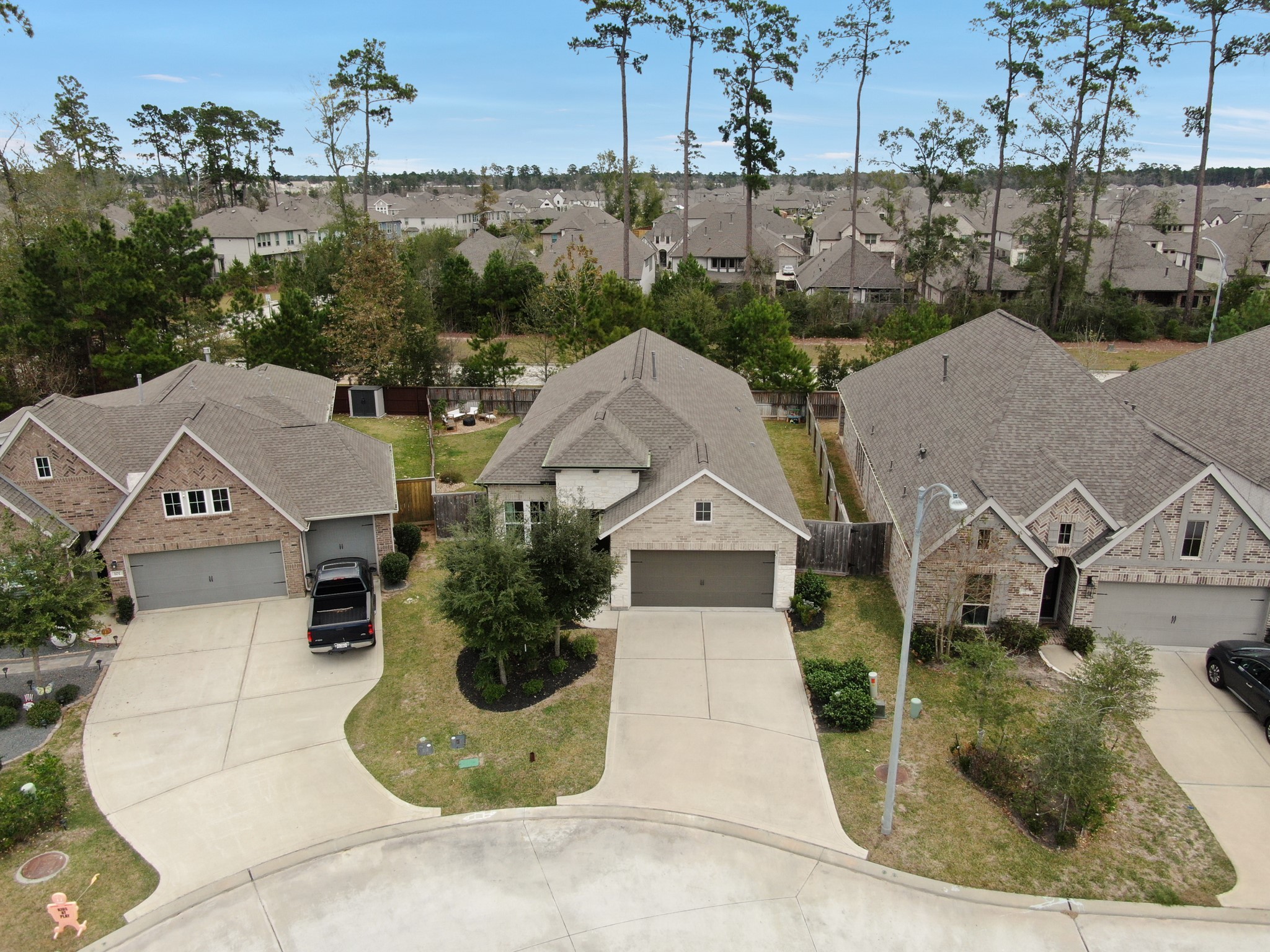 105 Dove Springs Court Conroe, TX 77304 - Photo 3 of 49 an aerial view of a house
