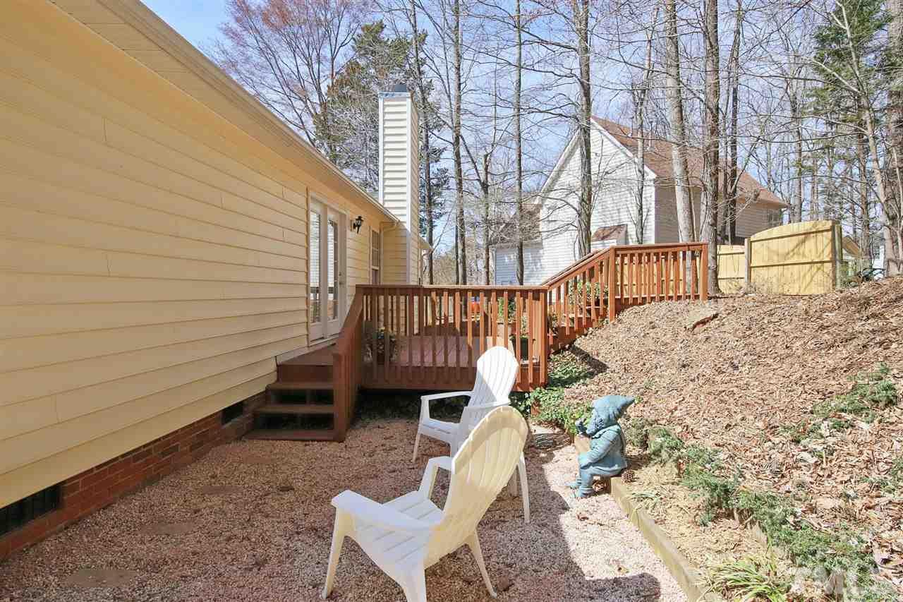 200 Melksham Road Wake Forest, NC 27587 - Photo 26 of 29 a view of entryway with wooden stairs