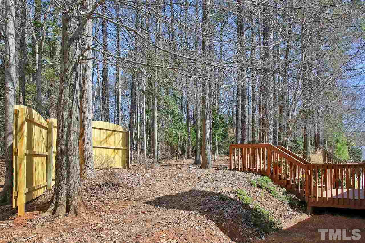 200 Melksham Road Wake Forest, NC 27587 - Photo 27 of 29 a view of a backyard with iron fence