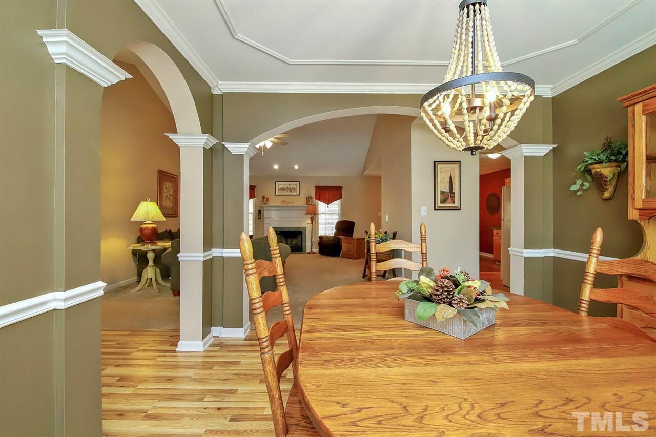 200 Melksham Road Wake Forest, NC 27587 - Photo 8 of 29 a view of a living room and kitchen
