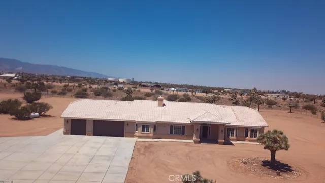 a view of a terrace with sitting area