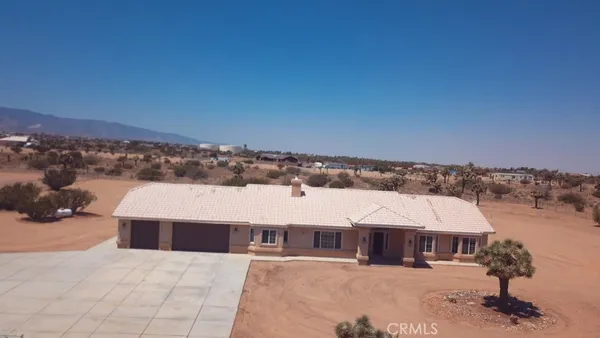 a view of a terrace with sitting area