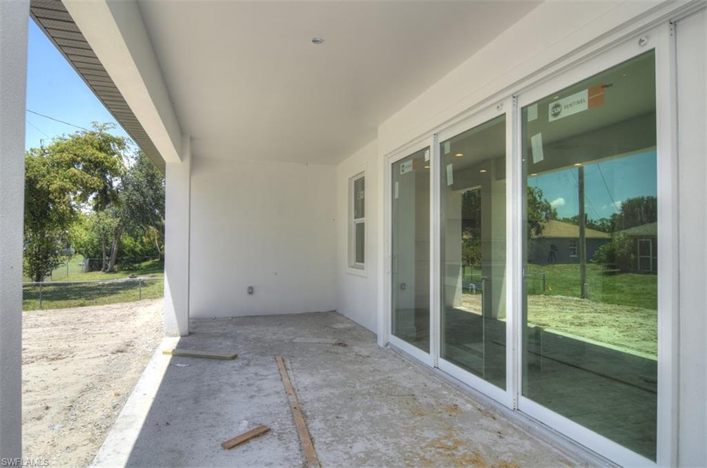 18412 Fuchsia Road Fort Myers, FL 33967 - Photo 3 of 23 a view of backyard with green space