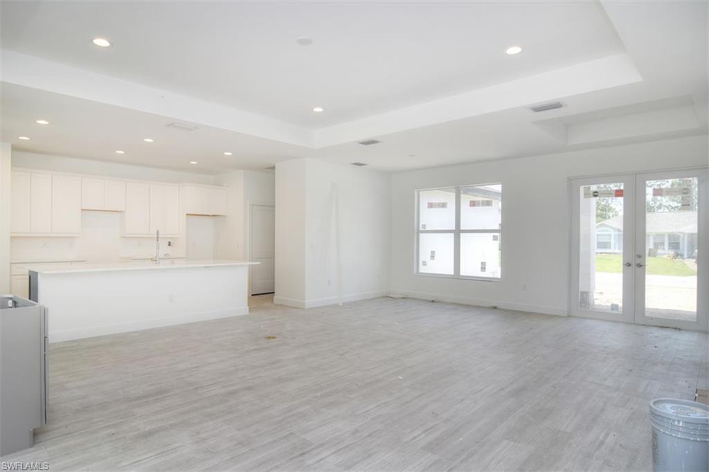 18412 Fuchsia Road Fort Myers, FL 33967 - Photo 5 of 23 a view of an empty room with a window