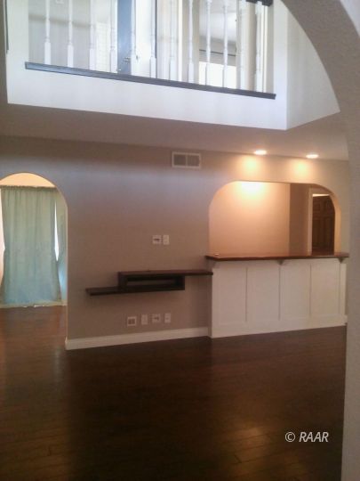 812 Bryann Street Ridgecrest, CA 93555 - Photo 7 of 34 a view of an empty room with a window
