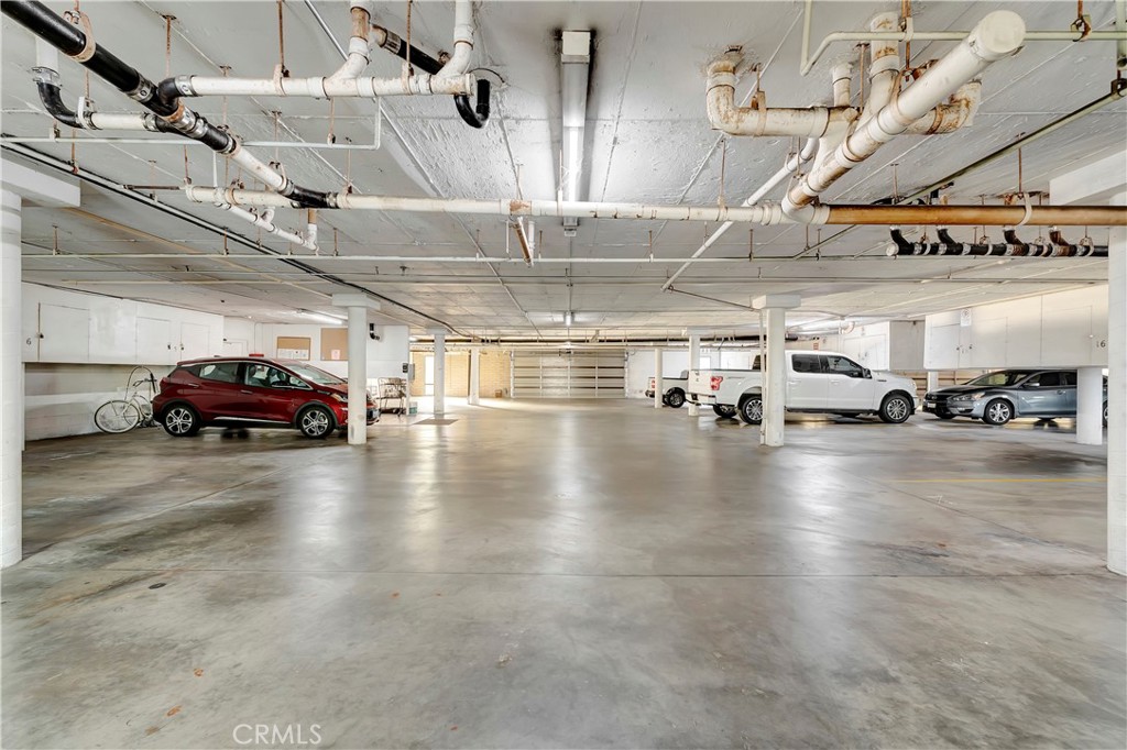 605 Redondo Avenue, Unit 308 Long Beach, CA 90814 - Photo 27 of 38 a view of parking space with parked cars