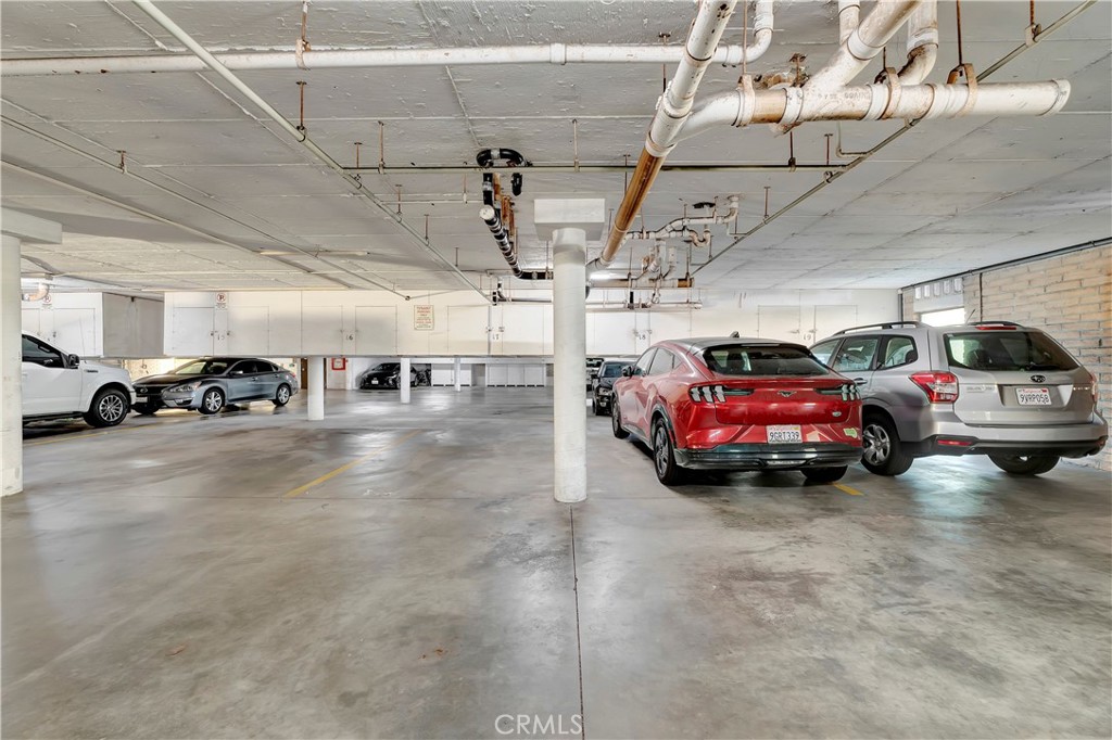 605 Redondo Avenue, Unit 308 Long Beach, CA 90814 - Photo 28 of 38 a view of cars parked in a parking