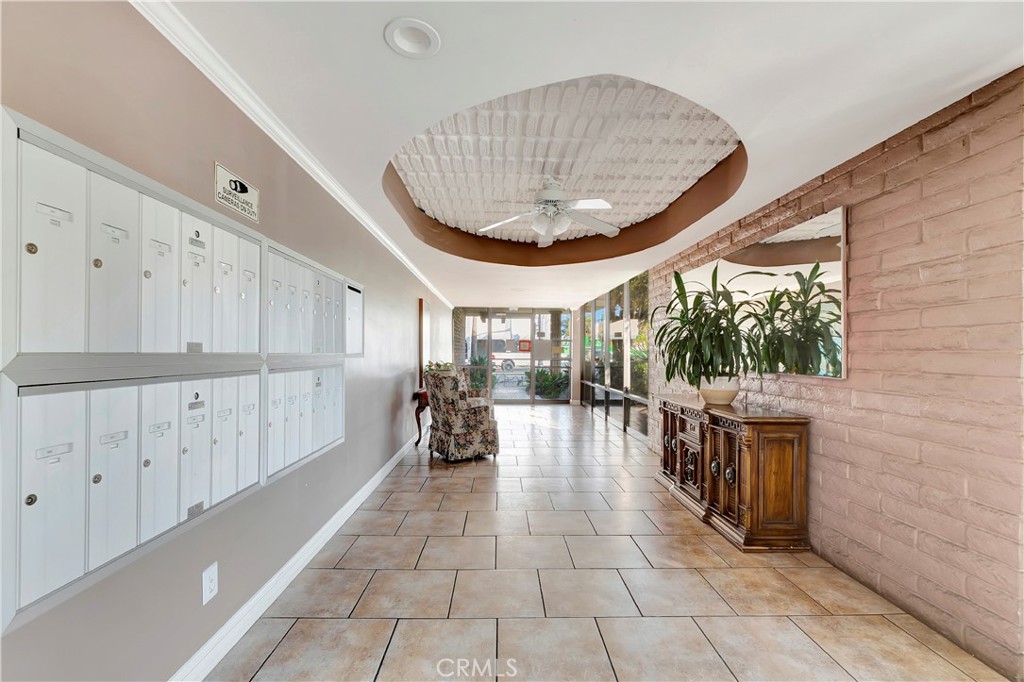 605 Redondo Avenue, Unit 308 Long Beach, CA 90814 - Photo 31 of 38 a very nice looking room with wooden floor and a large window