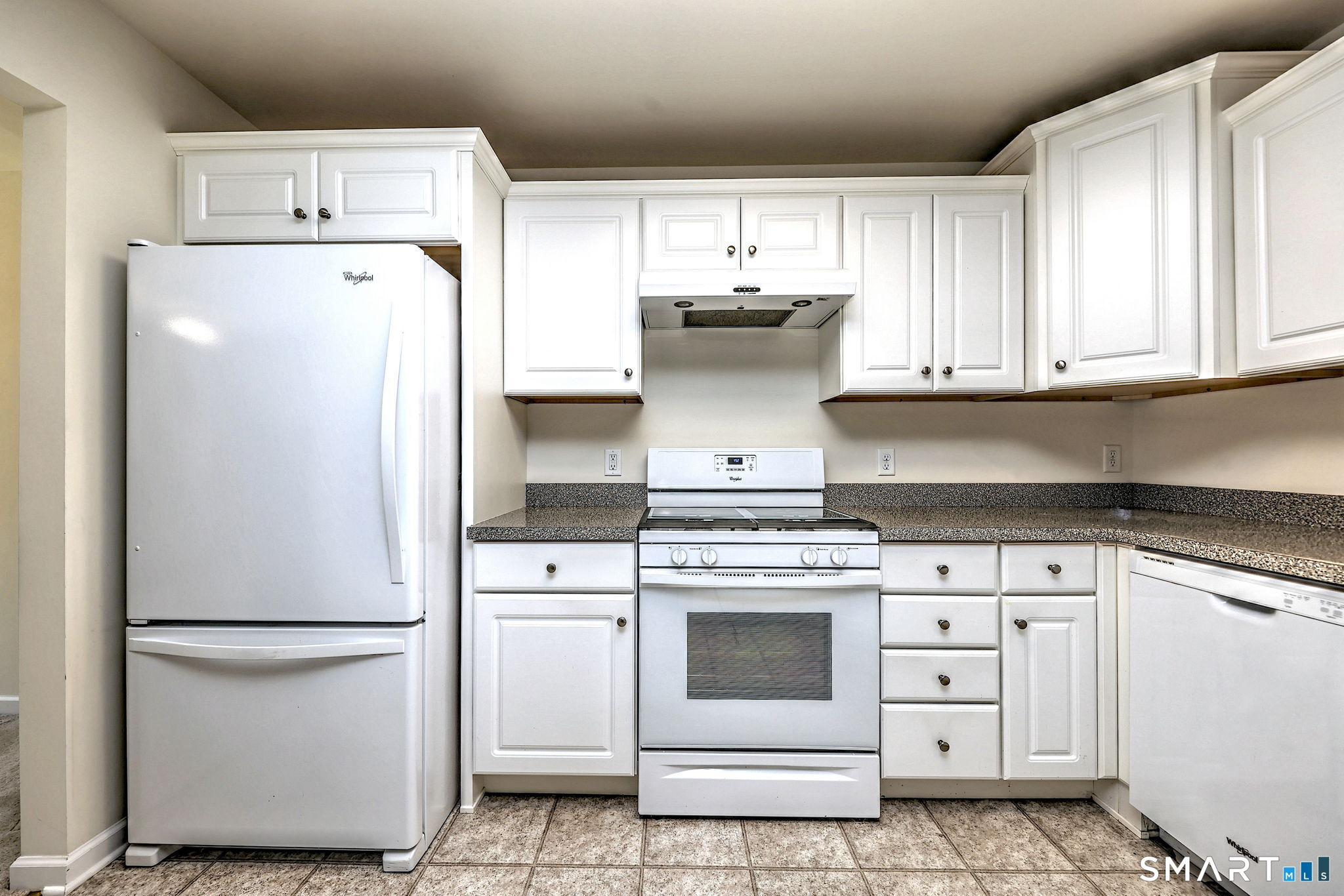 104 Cherry Circle, Unit 104 Prospect, CT 06712 - Photo 12 of 37 a kitchen with a stove top oven and refrigerator