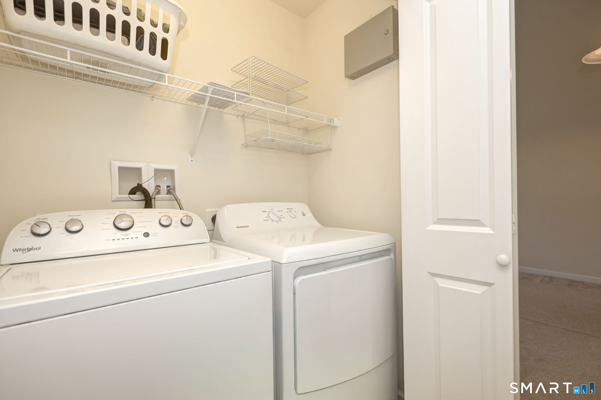 104 Cherry Circle, Unit 104 Prospect, CT 06712 - Photo 20 of 37 a utility room with dryer and washer