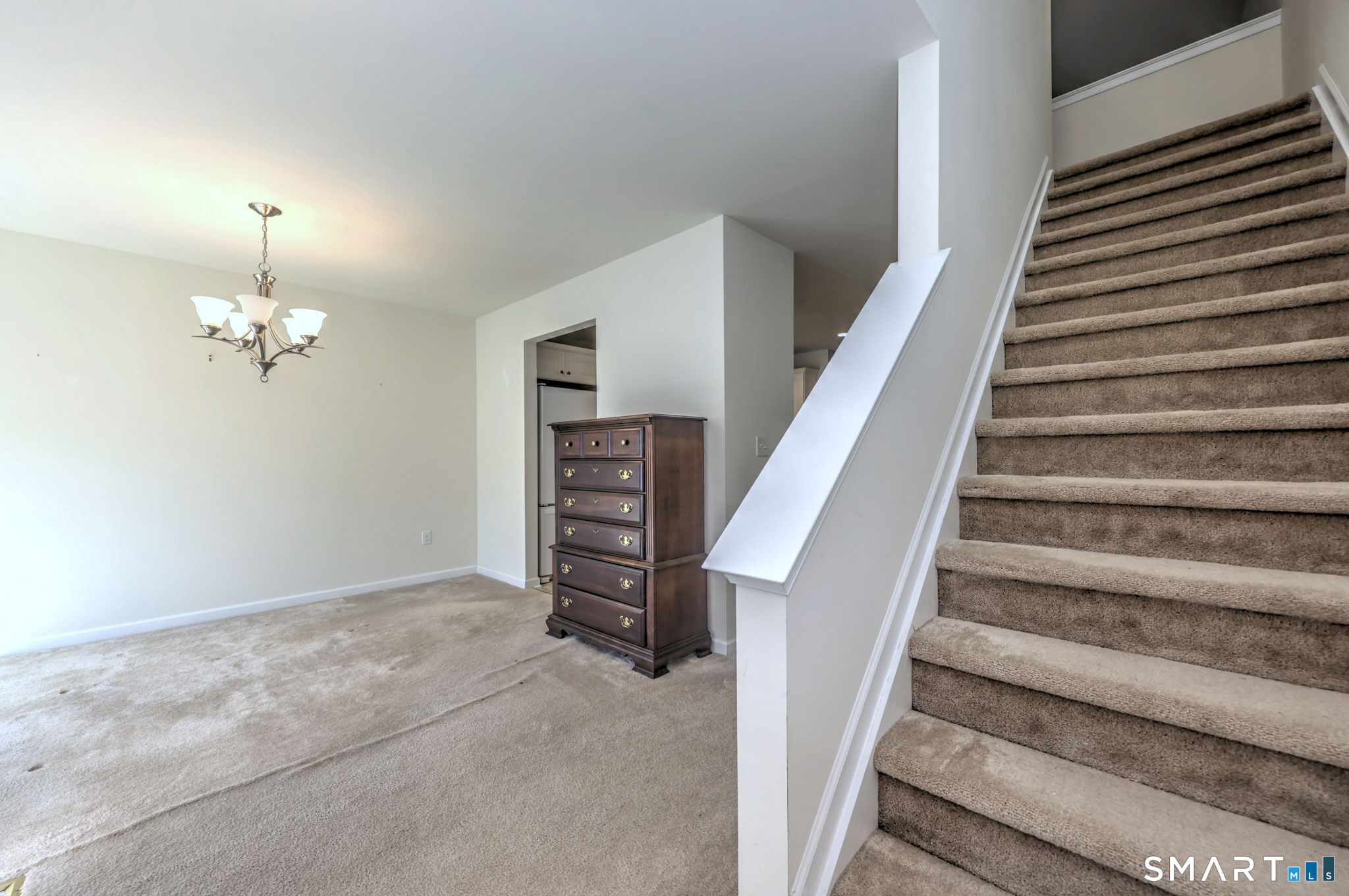 104 Cherry Circle, Unit 104 Prospect, CT 06712 - Photo 21 of 37 a view of entryway with furniture and stair