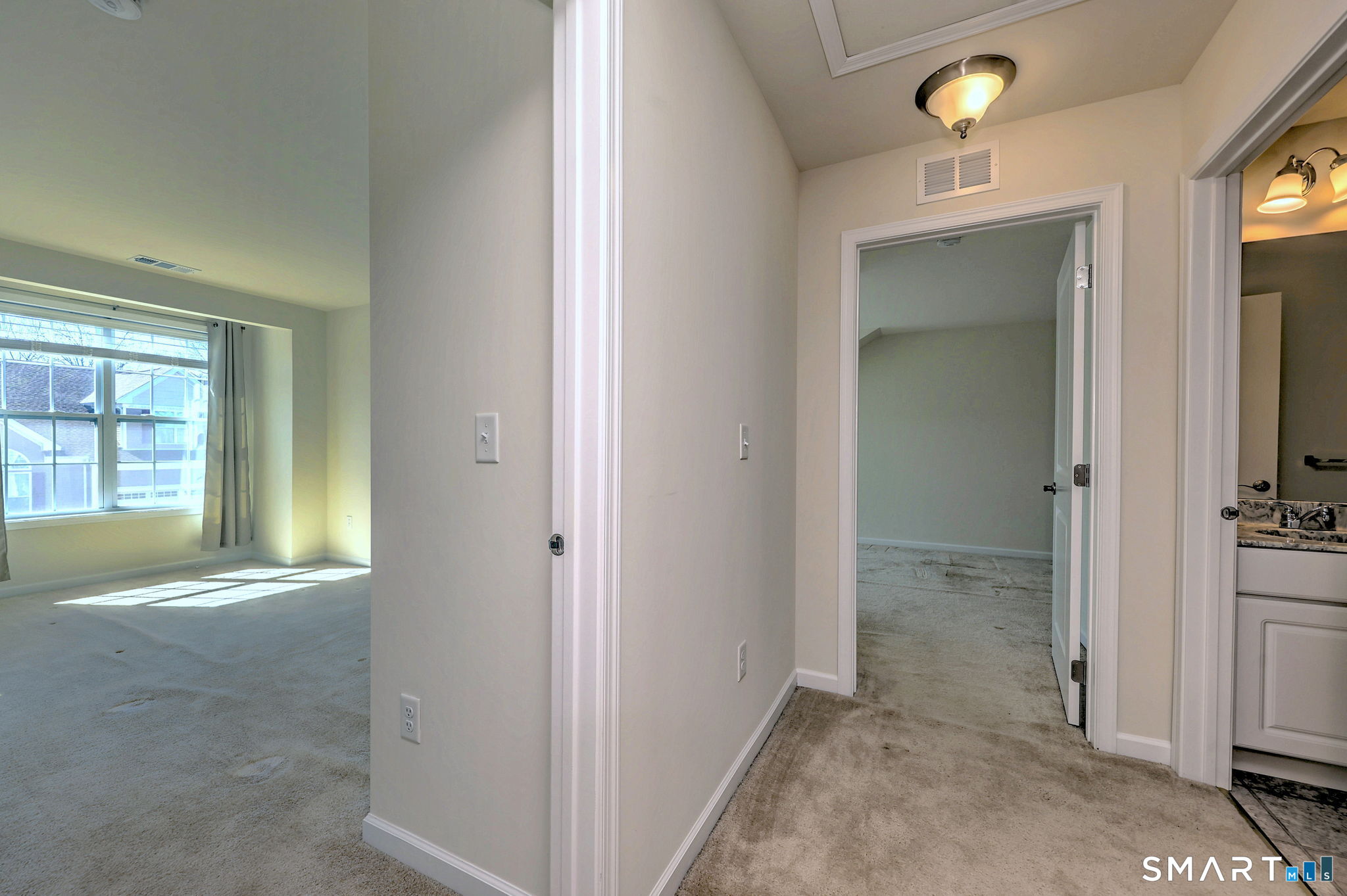 104 Cherry Circle, Unit 104 Prospect, CT 06712 - Photo 23 of 37 an empty room with a bathroom and a sink