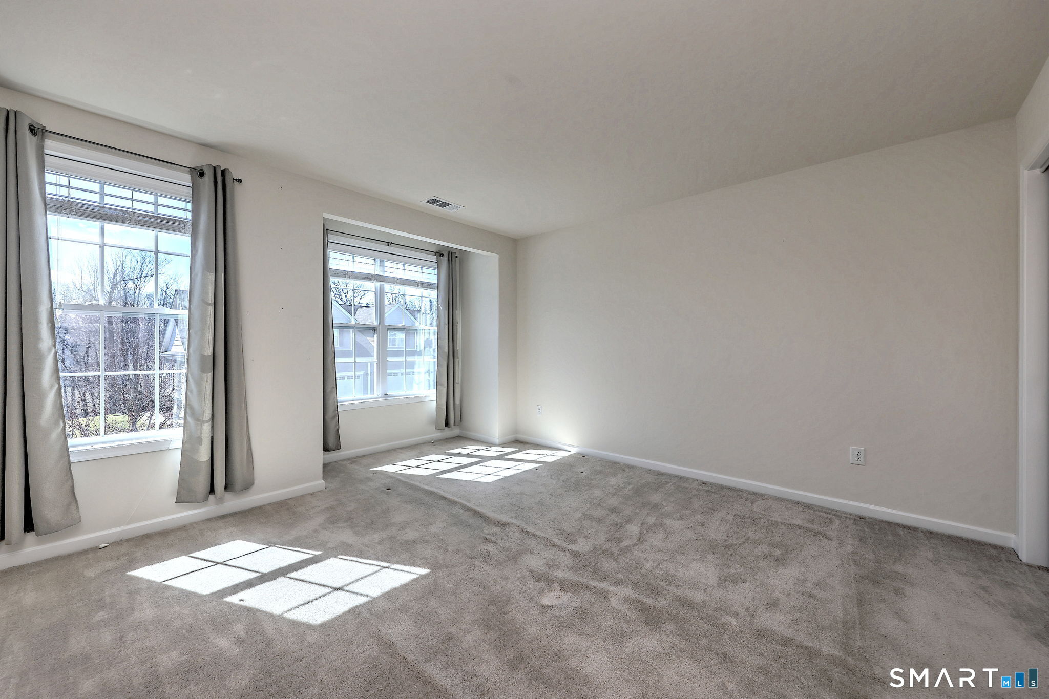 104 Cherry Circle, Unit 104 Prospect, CT 06712 - Photo 24 of 37 a view of an empty room with a window