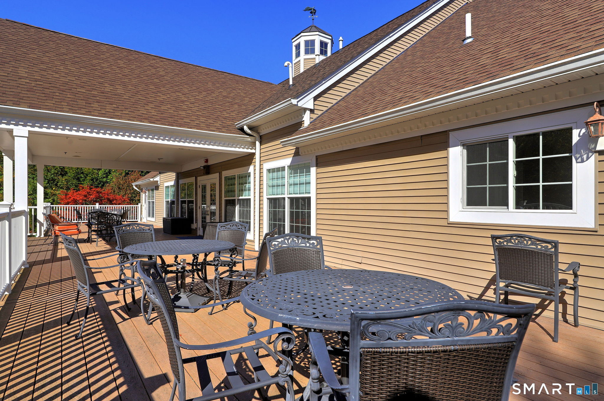 104 Cherry Circle, Unit 104 Prospect, CT 06712 - Photo 33 of 37 a view of a patio with table and chairs and potted plants