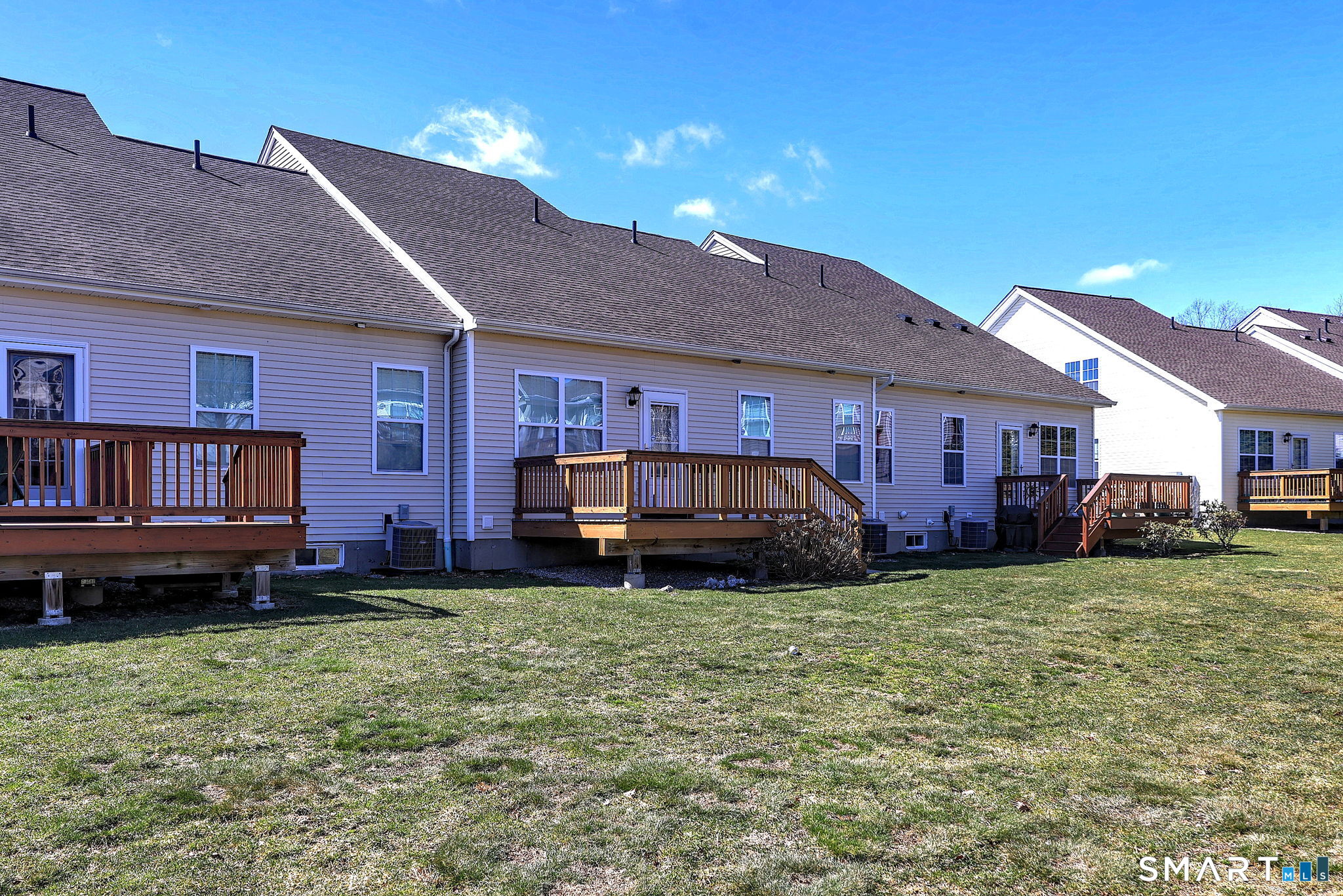 104 Cherry Circle, Unit 104 Prospect, CT 06712 - Photo 4 of 37 a house view with a garden space