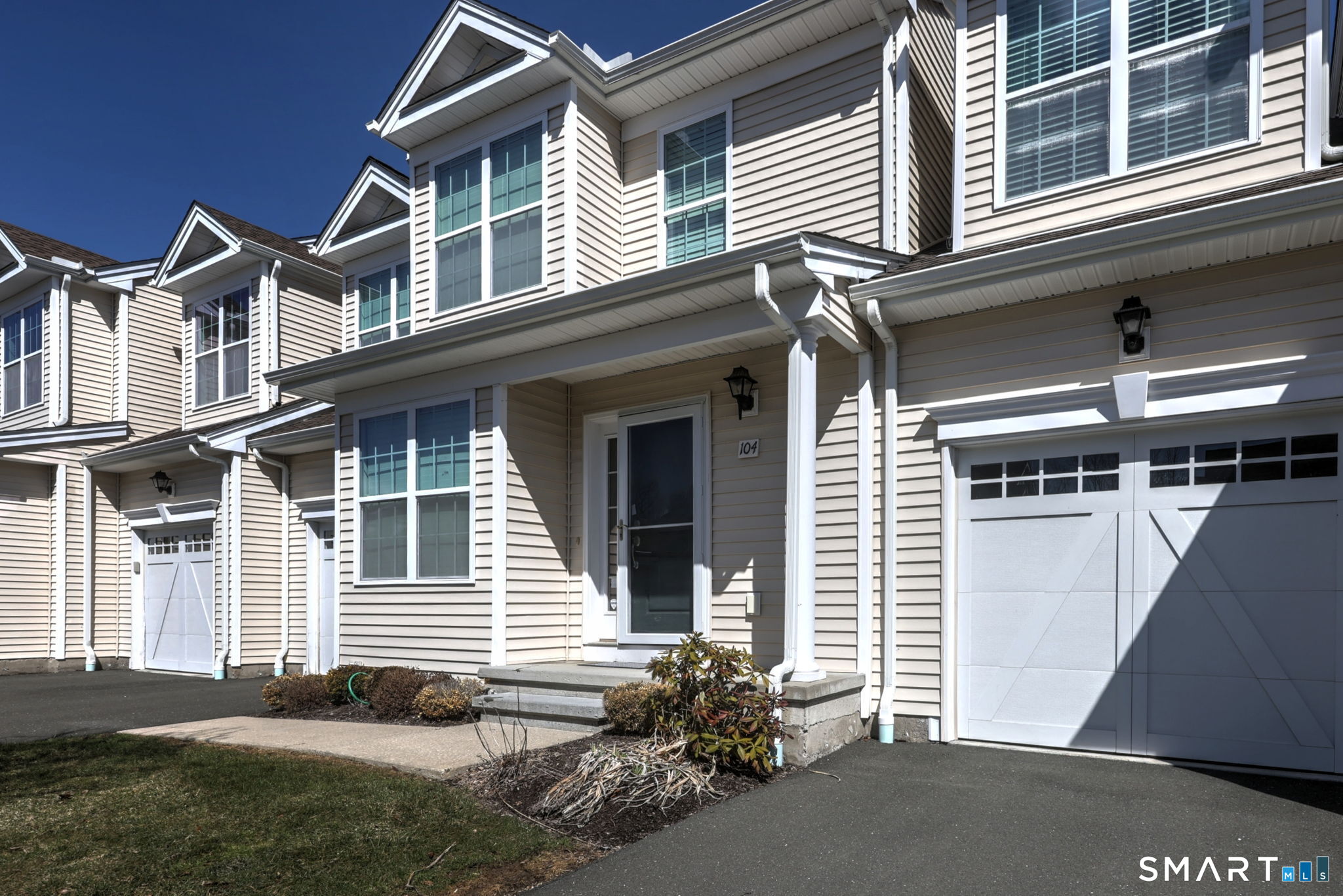104 Cherry Circle, Unit 104 Prospect, CT 06712 - Photo 7 of 37 a front view of house with yard