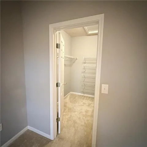 a view of a room with racks on the wall