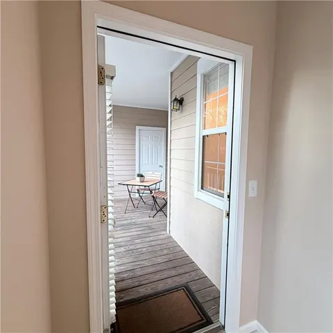 a view of outdoor space with deck and furniture