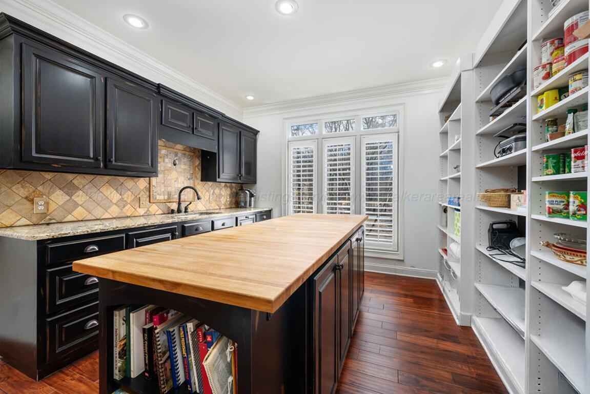 392 Baughn Road Jasper, AL 35503 - Photo 11 of 40 Large pantry off kitchen with tons of storage and prep island.