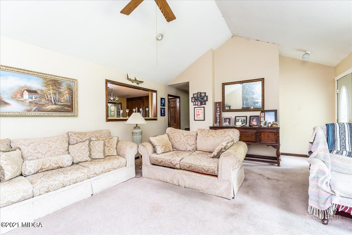 6464 Britt Road Macon, GA 31216 - Photo 3 of 10 a living room with furniture and a flat screen tv